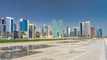 Fototapeta na wymiar The high-rise district of Doha with fountain timelapse
