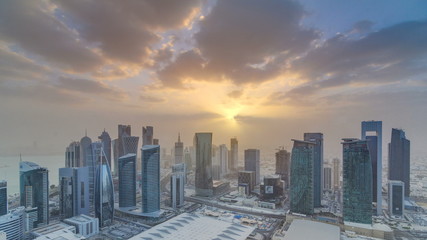 Skyscrapers at sunset timelapse in the skyline of commercial center of Doha, the capital Qatar