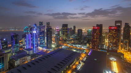 The skyline of the West Bay area from top in Doha day to night timelapse, Qatar.