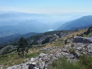 Fototapeta na wymiar Scenic mountain panorama of alps with glacier lake