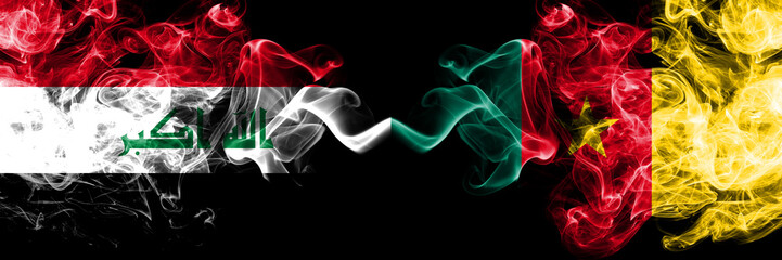 Iraq, Iraqi vs Cameroon, Cameroonian smoky mystic flags placed side by side. Thick colored silky smokes flags together.