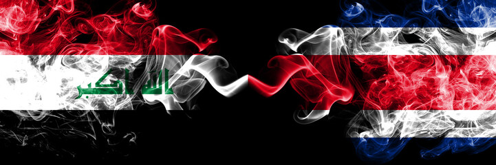Iraq, Iraqi vs Costa Rica smoky mystic flags placed side by side. Thick colored silky smokes flags together.