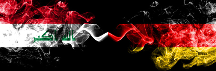 Iraq, Iraqi vs Germany, German smoky mystic flags placed side by side. Thick colored silky smokes flags together.