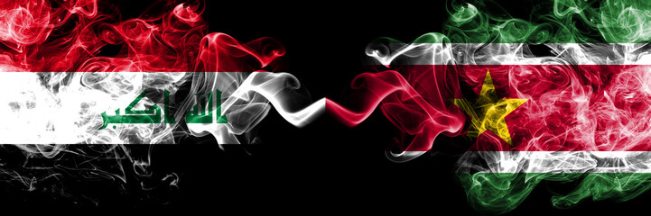 Iraq, Iraqi vs Suriname, Surinamese smoky mystic flags placed side by side. Thick colored silky smokes flags together.