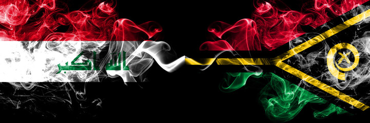 Iraq, Iraqi vs Vanuatu smoky mystic flags placed side by side. Thick colored silky smokes flags together.
