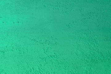 design shabby teal, sea-green limestone like plaster texture for background use.