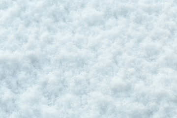 Fototapeta na wymiar Texture of natural snow. Top view of the snow.