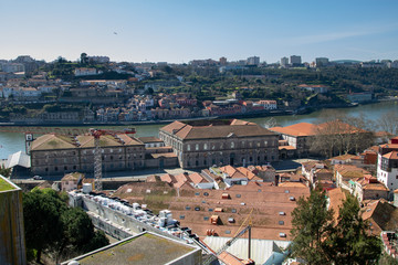 View over the city of Porto, old buildings next to Douro river.