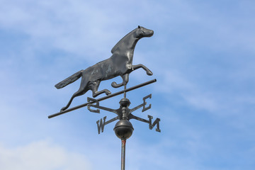 Trotting Horse Weather Vane Points to East Wind