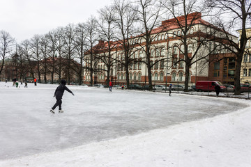 Helsinki, Finland. Ice skate ring close to St. John's Church (Johanneksenkirkko)