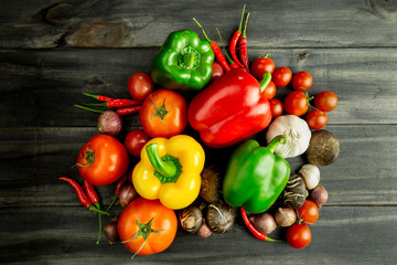 Colase up vegetables on the wooden background