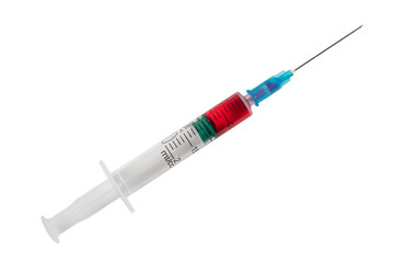 Syringe close up isolated on white background. Vaccine in plastic hypodermic syringe. Close-up of...