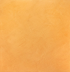 Bright yellow texture of the wall - decorative plaster. Emperor color