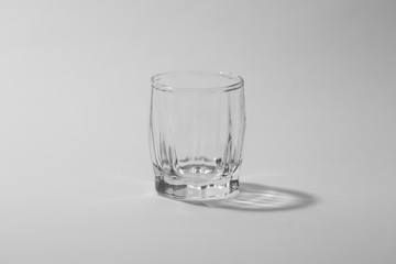 transparent small glasses on a white background