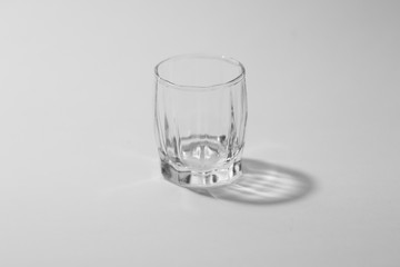 transparent small glasses on a white background