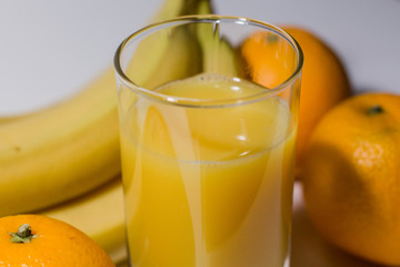 multivitamin juice near fruits