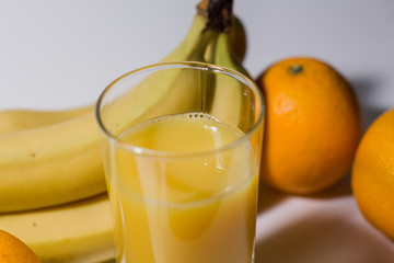 multivitamin juice near fruits
