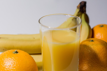 multivitamin juice near fruits