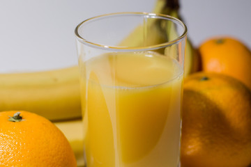 multivitamin juice near fruits