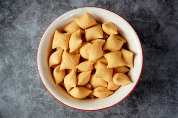 Corn chips with spices in a cup