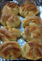 Homemade buns from the oven on a baking sheet