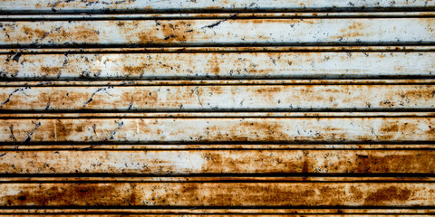 Old weathered aged steel door metal texture iron rusty background