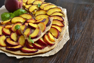 Crostata with peaches and fresh basil, tart, copy space