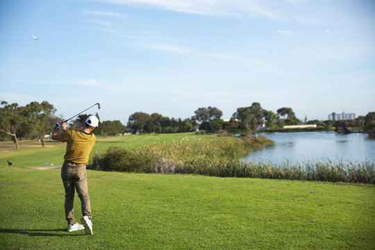 Golfer playing golf