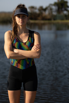 Female rower on a bridge
