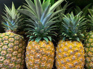 Close-Up Of Pineapples For Sale In Supermarket , Panama, Central America