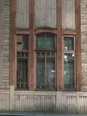 Window in an old wooden house, outside view