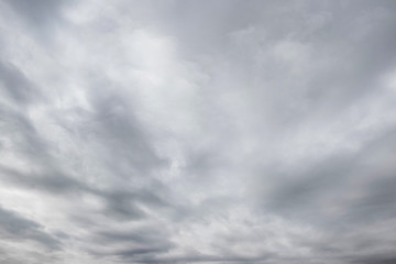 Gray clouds in a stormy sky. Clouds background for design_