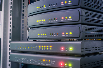 Several digital communication gateways are in the server room. Telephone voice routers are in the data center. Equipment for Internet connection works in computer racks