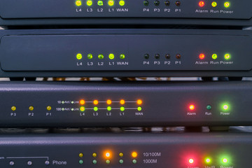 Devices for voice ip Internet connection are in racks. Technology concept. Network telephone...