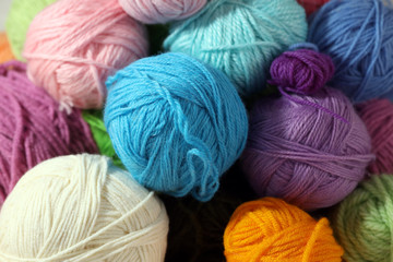 multi-colored bright balls of thread for knitting or crocheting