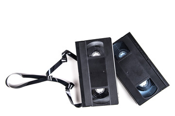 VHS video cassette isolated on white, retro video technology , analog magnetic tape 