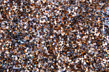 Confetti close up, various metallic  colors and shapes, horizontal background
