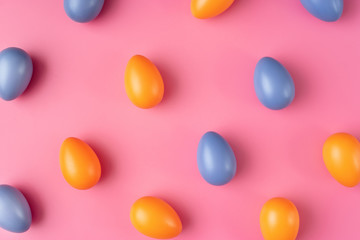 Colorful Easter Eggs on bright pink background