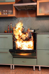 Fire in the house in the kitchen. Home insurance