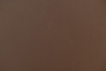 Background. light brown, chocolate paint on the wall. Cappuccino color, calm brown