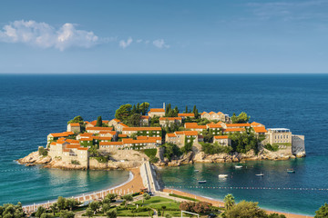 Fototapeta premium Sunny morning view of Sveti Stefan Island near city of Budva, Montenegro.