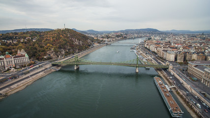 Aerial view of Petofi Bridge .Boat  Ride on the River Danube. Cloudy day. Budapest, Hungary