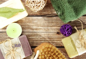 natural handmade soap on a wooden surface with space for text