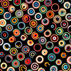 Fototapeta premium Abstract grungy image of many different circles in warm tones isolated on black background. Print of a modern funny simple art.