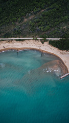 Aerial view on sandy beach beaten by waves, Bibione, Veneto, Italy