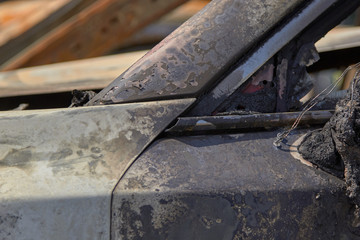 city burned cars after a fire in one of the city's districts