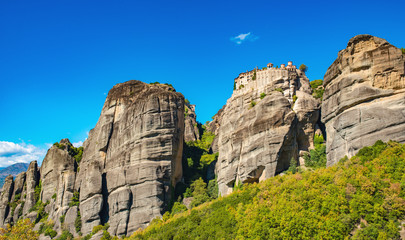 Meteora monastery on Corfu mountains with greenery.