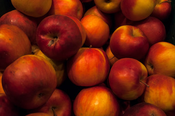 Fototapeta na wymiar Red sweet apples on showcase