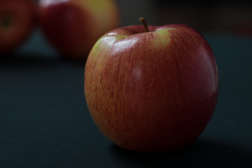 red apples close-up on a dark background