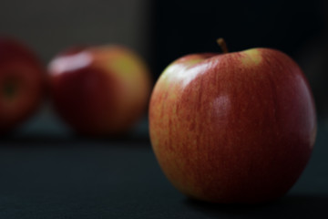 red apples close-up on a dark background